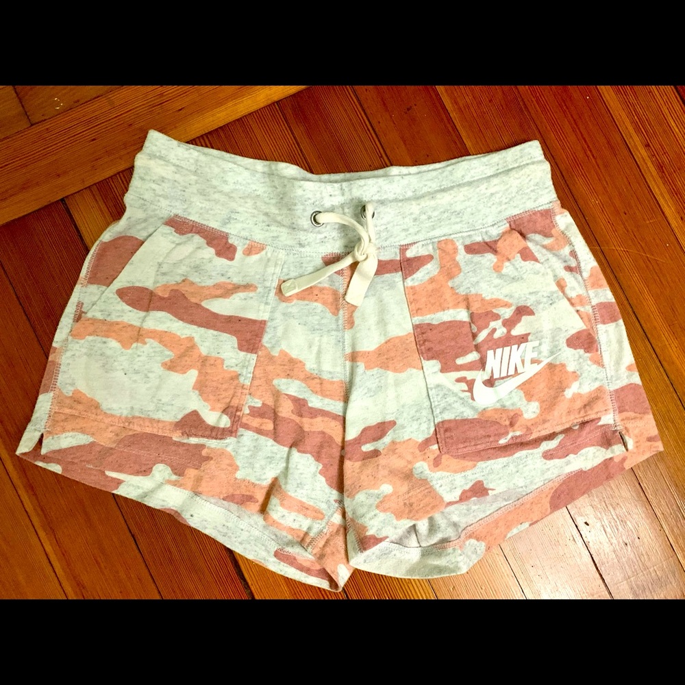 Nike Women Running Shorts. Listing shows two pieces for sale.